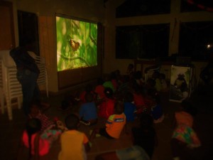 Educating local children with a screening of Colombia: Wild Magic